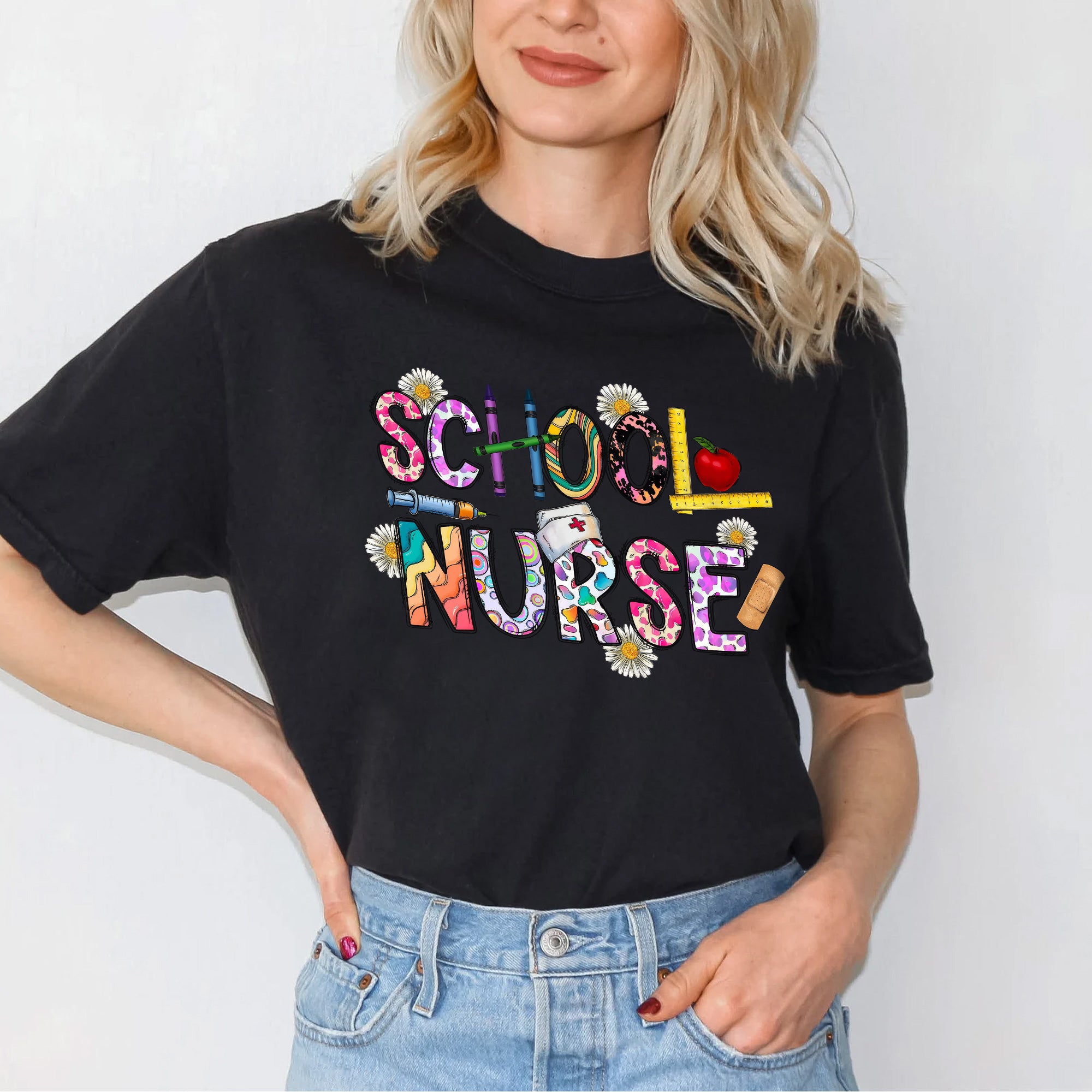 Cute School Nurse T-Shirt for Women – Colorful Letter Design with Crayons & Bandages – Fun Nurse Gift for Back to School