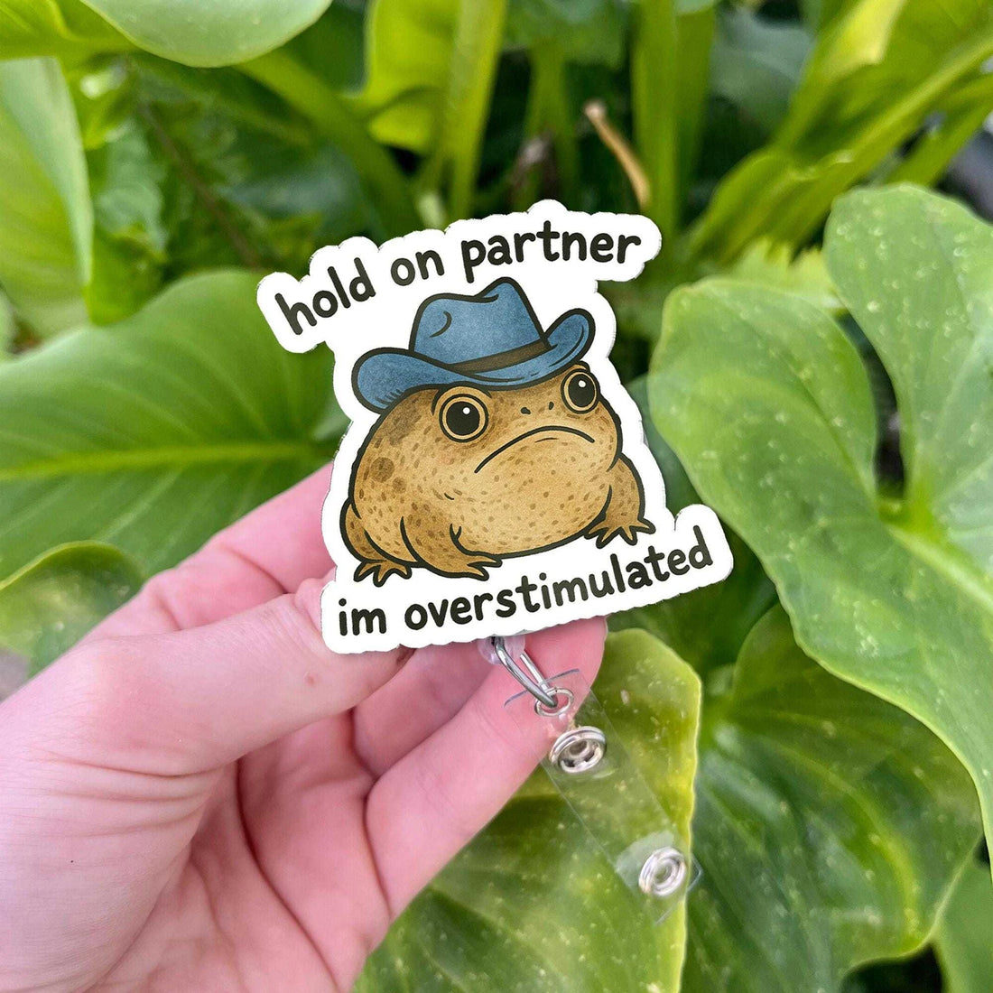 Hold On Partner Cowboy Rain Frog Badge Reel